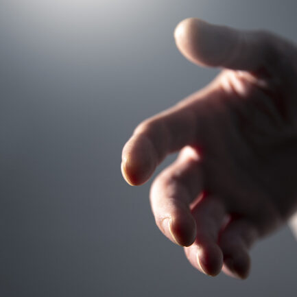 Hand of God or Jesus reaching